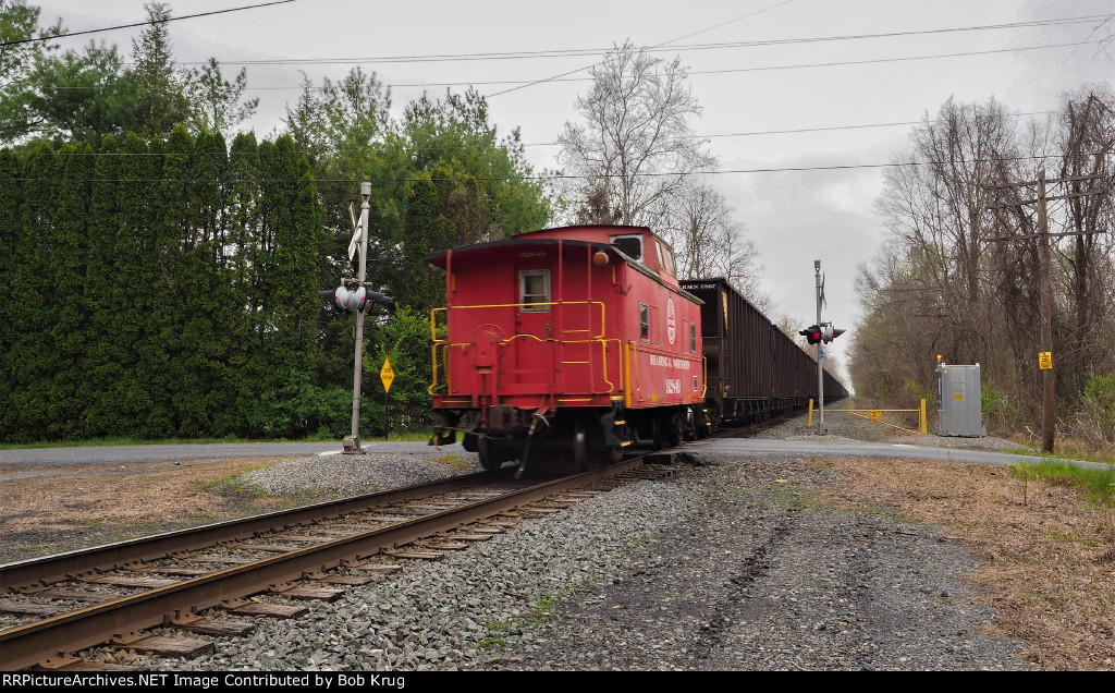 RBMN 92849 at the end of a 50-hopper car train.  